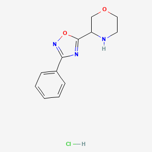 molecular formula C12H14ClN3O2 B1434154 3-(3-Phenyl-1,2,4-oxadiazol-5-yl)morpholine hydrochloride CAS No. 1803567-22-7