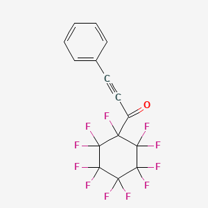 molecular formula C15H5F11O B14343210 3-Phenyl-1-(undecafluorocyclohexyl)prop-2-yn-1-one CAS No. 106226-84-0