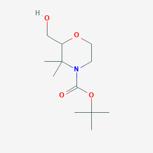 molecular formula C12H23NO4 B1435102 叔丁基 2-(羟甲基)-3,3-二甲基吗啉-4-甲酸酯 CAS No. 2091198-51-3