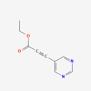 molecular formula C9H8N2O2 B1435321 Ethyl 3-(pyrimidin-5-yl)prop-2-ynoate CAS No. 1601954-87-3