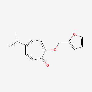 molecular formula C15H16O3 B14355396 2-[(Furan-2-yl)methoxy]-5-(propan-2-yl)cyclohepta-2,4,6-trien-1-one CAS No. 90687-40-4