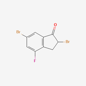 molecular formula C9H5Br2FO B1435830 2,6-dibromo-4-fluoro-2,3-dihydro-1H-inden-1-one CAS No. 1429232-50-7