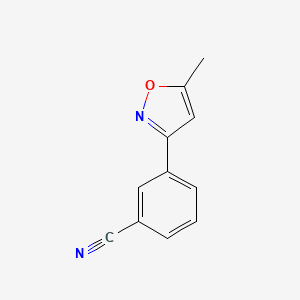 molecular formula C11H8N2O B1435917 3-(5-Methyl-isoxazol-3-yl)-benzonitrile CAS No. 1231244-50-0