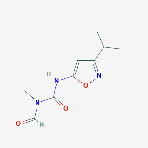 B14359712 N-Methyl-N-{[3-(propan-2-yl)-1,2-oxazol-5-yl]carbamoyl}formamide CAS No. 92178-79-5