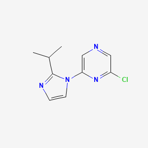 molecular formula C10H11ClN4 B1436119 2-Chloro-6-(2-isopropyl-1H-imidazol-1-yl)pyrazine CAS No. 1094842-75-7