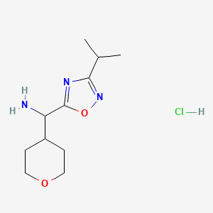 molecular formula C11H20ClN3O2 B1436215 Oxan-4-yl[3-(propan-2-yl)-1,2,4-oxadiazol-5-yl]methanamine hydrochloride CAS No. 1803609-84-8