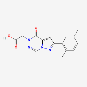 molecular formula C15H14N4O3 B1437189 [2-(2,5-二甲苯基)-4-氧代吡唑并[1,5-d][1,2,4]三嗪-5(4H)-基]乙酸 CAS No. 1232798-85-4