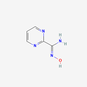molecular formula C5H6N4O B1437421 N'-hydroxypyrimidine-2-carboximidamide CAS No. 90993-49-0