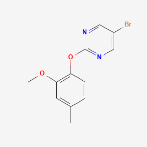B1437526 5-Bromo-2-(2-methoxy-4-methylphenoxy)pyrimidine CAS No. 1017789-03-5