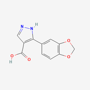 molecular formula C11H8N2O4 B1437933 5-(2H-1,3-benzodioxol-5-yl)-1H-pyrazole-4-carboxylic acid CAS No. 1152543-46-8