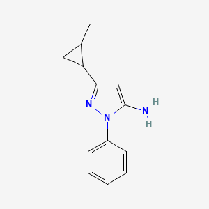 molecular formula C13H15N3 B1438211 3-(2-甲基环丙基)-1-苯基-1H-吡唑-5-胺 CAS No. 1152712-12-3