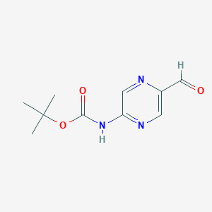 molecular formula C10H13N3O3 B1438451 tert-Butyl (5-formylpyrazin-2-yl)carbamate CAS No. 959617-71-1
