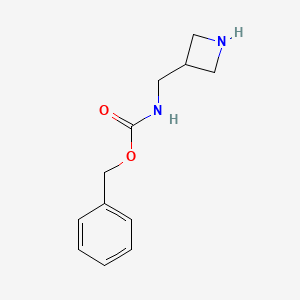 molecular formula C12H16N2O2 B1438467 benzyl N-(azetidin-3-ylmethyl)carbamate CAS No. 876149-41-6