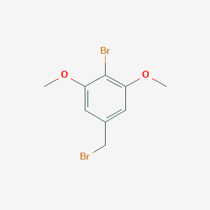 molecular formula C9H10Br2O2 B1438607 2-Bromo-5-(bromomethyl)-1,3-dimethoxybenzene CAS No. 948550-74-1