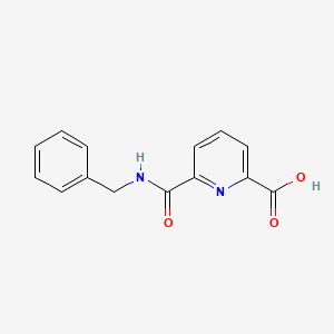 molecular formula C14H12N2O3 B1438763 6-(Benzylcarbamoyl)pyridine-2-carboxylic acid CAS No. 679398-19-7