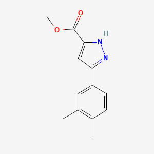 molecular formula C13H14N2O2 B1438962 methyl 3-(3,4-dimethylphenyl)-1H-pyrazole-5-carboxylate CAS No. 192701-98-7