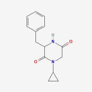 molecular formula C14H16N2O2 B1440625 3-Benzyl-1-cyclopropylpiperazine-2,5-dione CAS No. 1283107-91-4