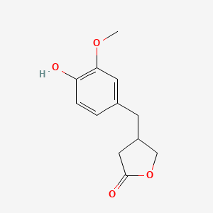 molecular formula C12H14O4 B14409771 4-[(4-Hydroxy-3-methoxyphenyl)methyl]oxolan-2-one CAS No. 84755-40-8