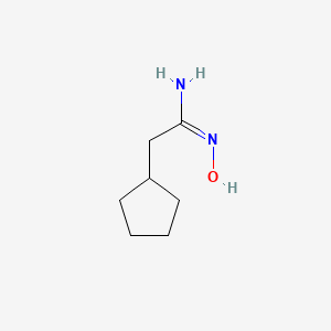 molecular formula C7H14N2O B1441328 (1E)-2-cyclopentyl-N'-hydroxyethanimidamide CAS No. 1251415-24-3