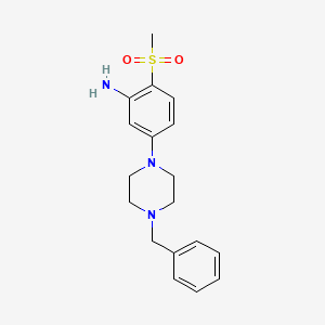 molecular formula C18H23N3O2S B1441975 5-(4-Benzyl-1-piperazinyl)-2-(methylsulfonyl)-phenylamine CAS No. 1219972-42-5
