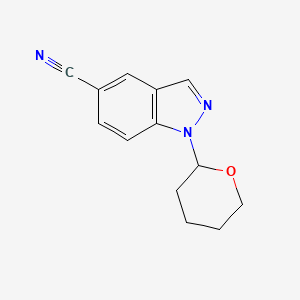molecular formula C13H13N3O B1442317 1-(四氢-2H-吡喃-2-基)-1H-吲唑-5-腈 CAS No. 1173003-54-7