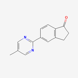 molecular formula C14H12N2O B1442423 5-(5-Methylpyrimidin-2-yl)-indan-1-one CAS No. 1334784-76-7