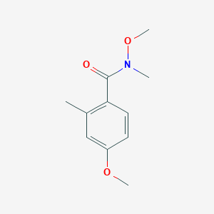 molecular formula C11H15NO3 B1442431 N,4-dimethoxy-N,2-dimethylbenzamide CAS No. 1803598-57-3