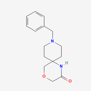 molecular formula C15H20N2O2 B1442662 9-Benzyl-4-oxa-1,9-diazaspiro[5.5]undecan-2-one CAS No. 1169699-61-9