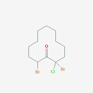 molecular formula C12H19Br2ClO B14429540 2,12-Dibromo-2-chlorocyclododecan-1-one CAS No. 79265-58-0