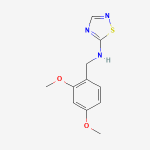 molecular formula C11H13N3O2S B1443121 N-(2,4-二甲氧基苄基)-1,2,4-噻二唑-5-胺 CAS No. 1063733-41-4