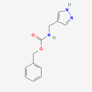 molecular formula C12H13N3O2 B1443366 benzyl N-(1H-pyrazol-4-ylmethyl)carbamate CAS No. 1184024-26-7