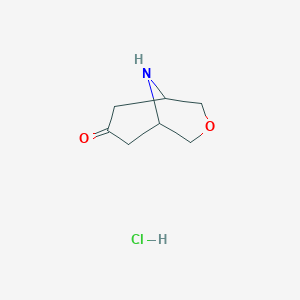 molecular formula C7H12ClNO2 B1443719 3-氧杂-9-氮杂双环[3.3.1]壬烷-7-酮盐酸盐 CAS No. 1126795-00-3