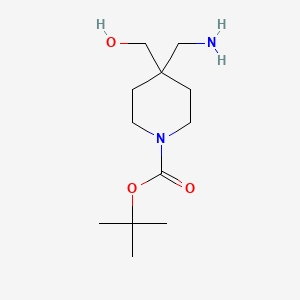 molecular formula C12H24N2O3 B1443760 Tert-butyl 4-(aminomethyl)-4-(hydroxymethyl)piperidine-1-carboxylate CAS No. 1416984-76-3