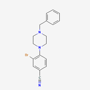 molecular formula C18H18BrN3 B1444029 4-(4-Benzylpiperazin-1-yl)-3-bromobenzonitrile CAS No. 1260652-69-4