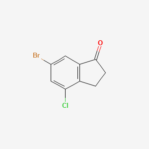 molecular formula C9H6BrClO B1444157 6-bromo-4-chloro-2,3-dihydro-1H-inden-1-one CAS No. 1260017-17-1