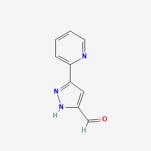 molecular formula C9H7N3O B1444357 5-(pyridin-2-yl)-1H-pyrazole-3-carbaldehyde CAS No. 865815-72-1