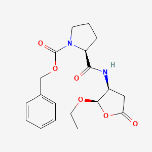 molecular formula C19H24N2O6 B1444412 (S)-苯甲基 2-(((2R,3S)-2-乙氧基-5-氧代四氢呋喃-3-基)氨基甲酰基)吡咯烷-1-羧酸酯 CAS No. 864167-16-8
