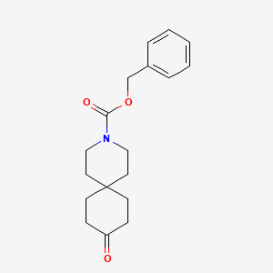 molecular formula C18H23NO3 B1444797 苄基9-氧代-3-氮杂螺[5.5]十一烷-3-羧酸酯 CAS No. 1056629-20-9