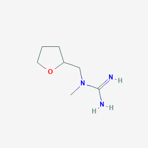 molecular formula C7H15N3O B1444946 1-Methyl-1-(oxolan-2-ylmethyl)guanidine CAS No. 1250349-48-4