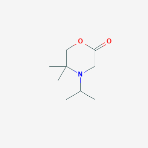 B144619 5,5-Dimethyl-4-propan-2-ylmorpholin-2-one CAS No. 136476-54-5