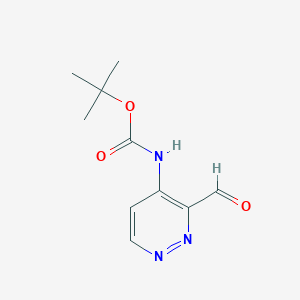 B1446928 (3-Formyl-pyridazin-4-yl)-carbamic acid tert-butyl ester CAS No. 1414958-85-2