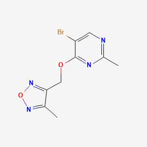 B1447049 5-Bromo-2-methyl-4-[(4-methyl-1,2,5-oxadiazol-3-yl)methoxy]pyrimidine CAS No. 1803598-74-4