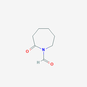 molecular formula C7H11NO2 B14479260 2-Oxoazepane-1-carbaldehyde CAS No. 65848-45-5