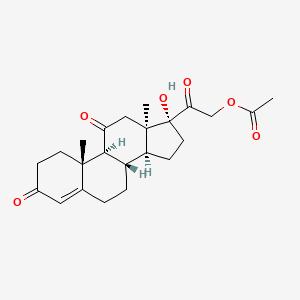 molecular formula C23H30O6 B1448075 2-[(1S,2R,10S,11S,14R,15R)-14-hydroxy-2,15-dimethyl-5,17-dioxotetracyclo[8.7.0.0^{2,7}.0^{11,15}]heptadec-6-en-14-yl]-2-oxoethyl acetate CAS No. 1486485-40-8