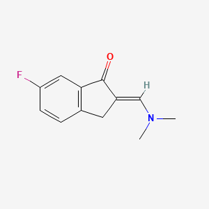 molecular formula C12H12FNO B1448333 2-[(Dimethylamino)methylene]-6-fluoroindan-1-one CAS No. 1427462-76-7
