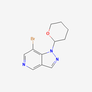 molecular formula C11H12BrN3O B1448920 7-溴-1-(四氢-2H-吡喃-2-基)-1H-吡唑并[4,3-c]吡啶 CAS No. 1416712-42-9