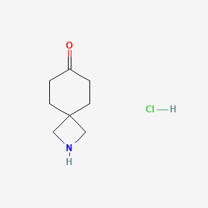 molecular formula C8H14ClNO B1448928 2-氮杂螺[3.5]壬烷-7-酮盐酸盐 CAS No. 2098118-42-2