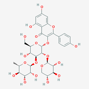 molecular formula C32H38O19 B144900 5,7-dihydroxy-3-[(2R,3R,4S,5R,6R)-5-hydroxy-6-(hydroxymethyl)-4-[(2S,3R,4R,5R,6S)-3,4,5-trihydroxy-6-methyloxan-2-yl]oxy-3-[(2S,3R,4S,5R)-3,4,5-trihydroxyoxan-2-yl]oxyoxan-2-yl]oxy-2-(4-hydroxyphenyl)chromen-4-one CAS No. 131573-90-5