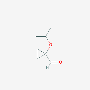 molecular formula C7H12O2 B1449657 1-(Propan-2-yloxy)cyclopropane-1-carbaldehyde CAS No. 1894123-87-5