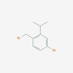 molecular formula C10H12Br2 B1450066 Benzene, 4-bromo-1-(bromomethyl)-2-(1-methylethyl)- CAS No. 1370601-38-9
